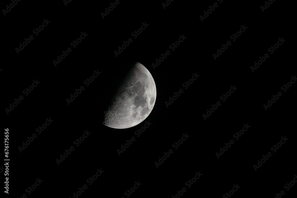 Half Moon in a clear nights sky Half Moon in a clear nights sky