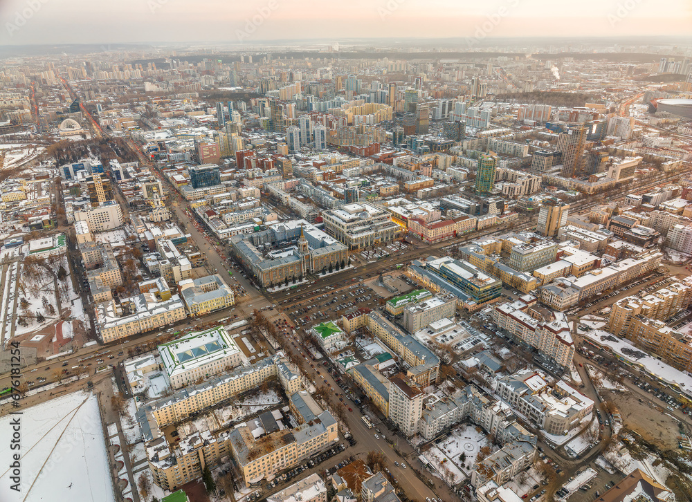 Fototapeta premium Yekaterinburg aerial panoramic view in Winter at sunset. Ekaterinburg is the fourth largest city in Russia located in the Eurasian continent on the border of Europe and Asia.
