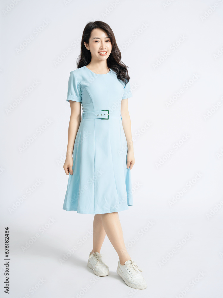 Photo of young Asian woman on background Photo of young Asian woman on background