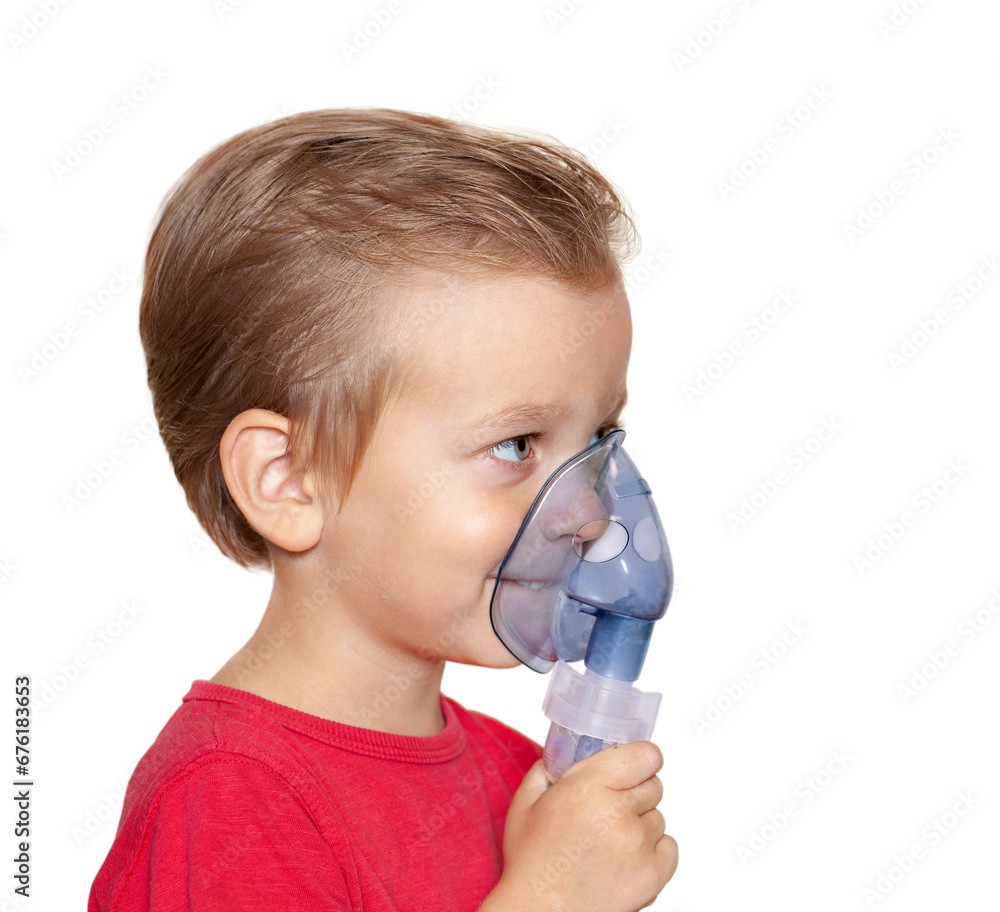 the little smilling boy in the inhalation mask