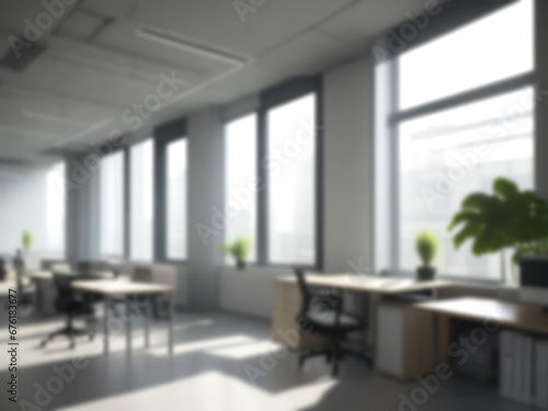 Blurred image of mordern office with sunlight for background usage. Blur interior background concept. © nilawan