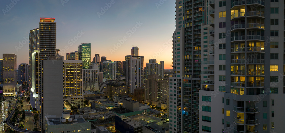 Obraz premium Aerial view of downtown office district of of Miami Brickell in Florida, USA at night. High commercial and residential skyscraper buildings in modern american megapolis