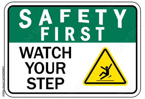 Watch your step warning sign and labels photo