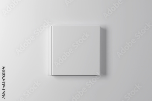 Thick square hardcover book mockup. 3D rendering photo