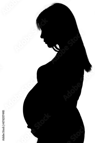 silhouette of pregnant woman holding her belly. Black and white. copy space. motherhood concept. Future mom.