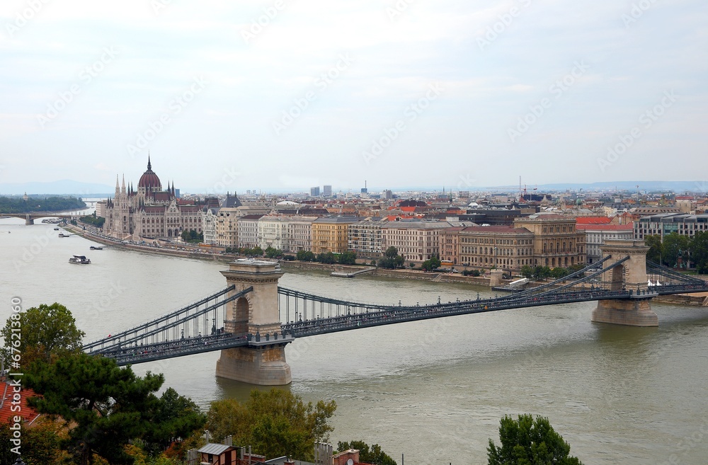 Budapest, B, Hungary - August 18, 2023: Skyline with Parliament Building and Bridge of chains over Danube River
