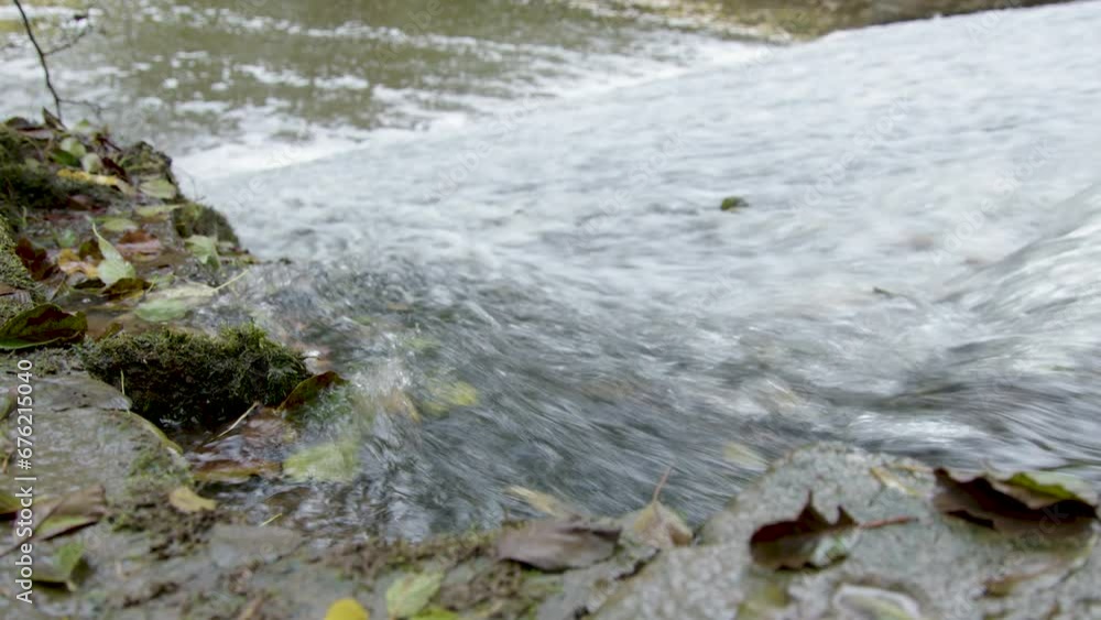 Close up water flow of the Leigh Brook flowing through the Knapp and Paper-mill Abberley and Malvern Hills Geopark. Close up water flow of the Leigh Brook flowing through the Knapp and Paper-mill Abberley and Malvern Hills Geopark.
