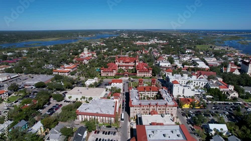 Beautiful aerial footage of the St Augustine, the oldest town in USA. the castle of San Marcos National Monument, Flagler College and the Matanzas Bay photo