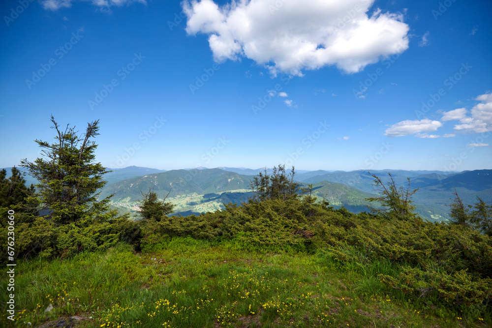 Summer landscape in mountains and blue sky with clouds. Carpathian, Ukraine, Europe.