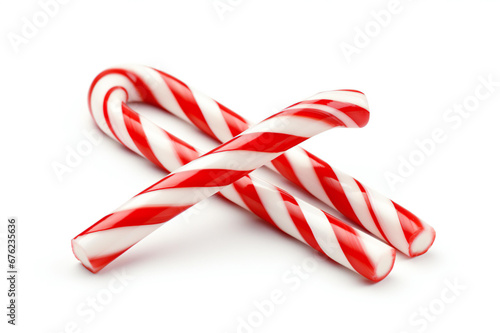 Christmas candy canes. Christmas stick. Traditional Christmas candy with red, green, and white stripes. Santa caramel cane with striped pattern isolated on a white background