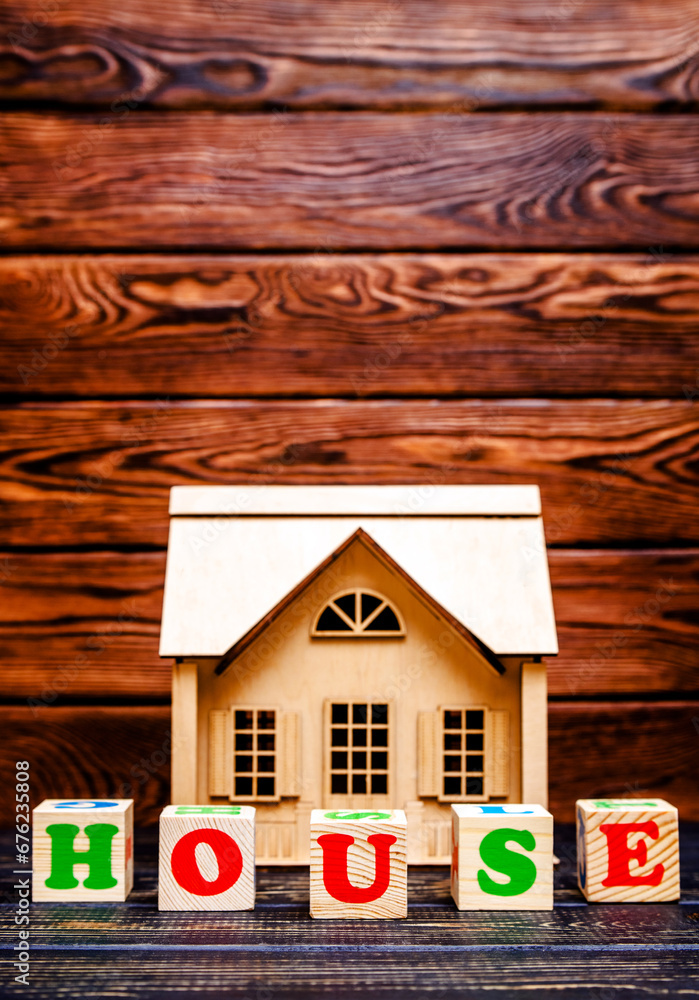 Wooden home and text on the cubes house
Wooden home and text on the cubes house