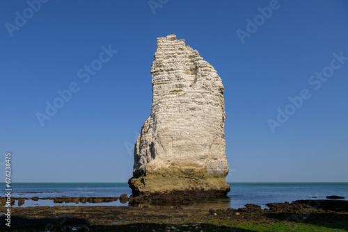 Chalk cliffs of Etretat on a sunny day in summer