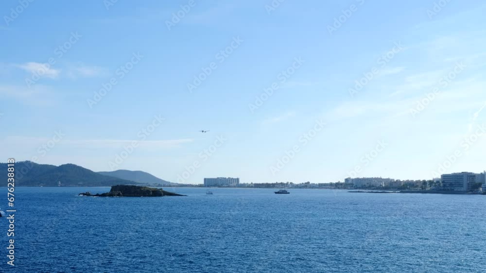 Ibiza City Bay with Airplane Landing on a Sunny Summer Day SATIC Ibiza City Bay with Airplane Landing on a Sunny Summer Day SATIC