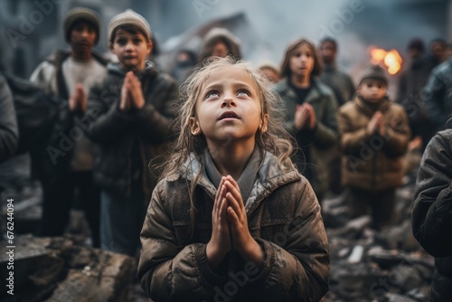 The crying faces of boys and girls raised their hands to pray to protection and to stop war. destroyed houses and the people grieving in the background