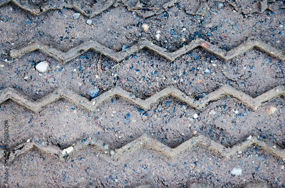 Zigzag lines of tire marks on the ground Zigzag lines of tire marks on the ground
