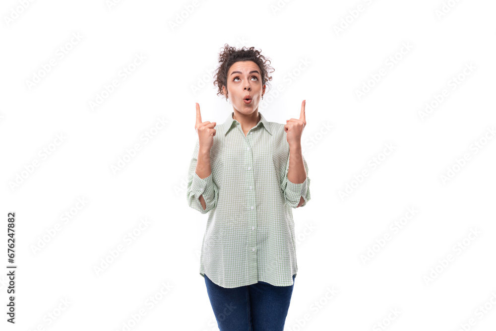 young cute caucasian brunette woman with curly hair dressed in an oversized shirt is inspired and wants to share the news young cute caucasian brunette woman with curly hair dressed in an oversized shirt is inspired and wants to share the news