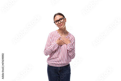 young cheerful slim business lady with a ponytail hairstyle wears glasses and a striped shirt on a white background