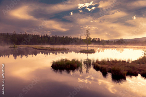 Mountain Lake Laka in Sumava national park in Czech republic. Sunset sky.  © martinlisner