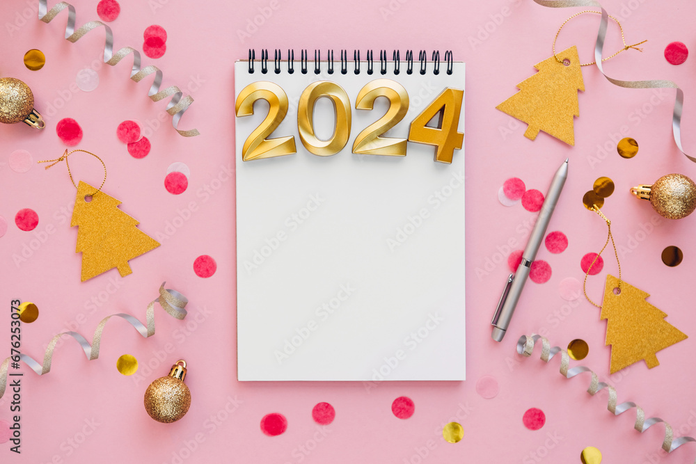 Notebook with pen and space for text for writing future plans. 2024 is coming concept