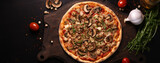 Mushroom pizza with mushrooms and spices on the table