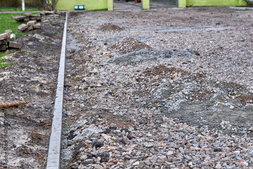 Vászonkép Roadbed with crushed stone prepared for asphalt laying