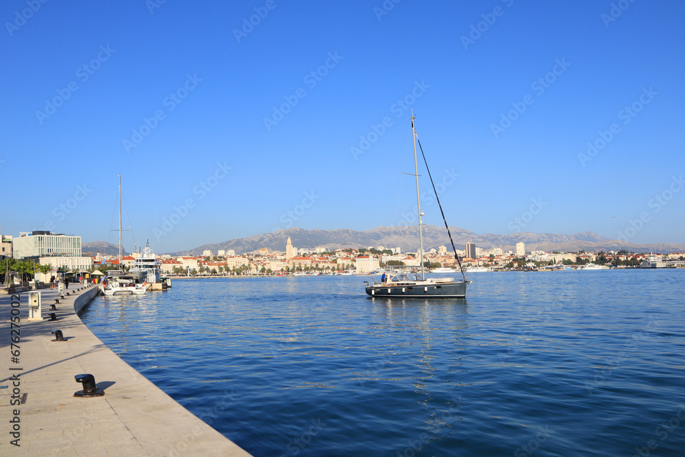 View of the embankment in the old town and yacht in Split, Dalmatia, Croatia