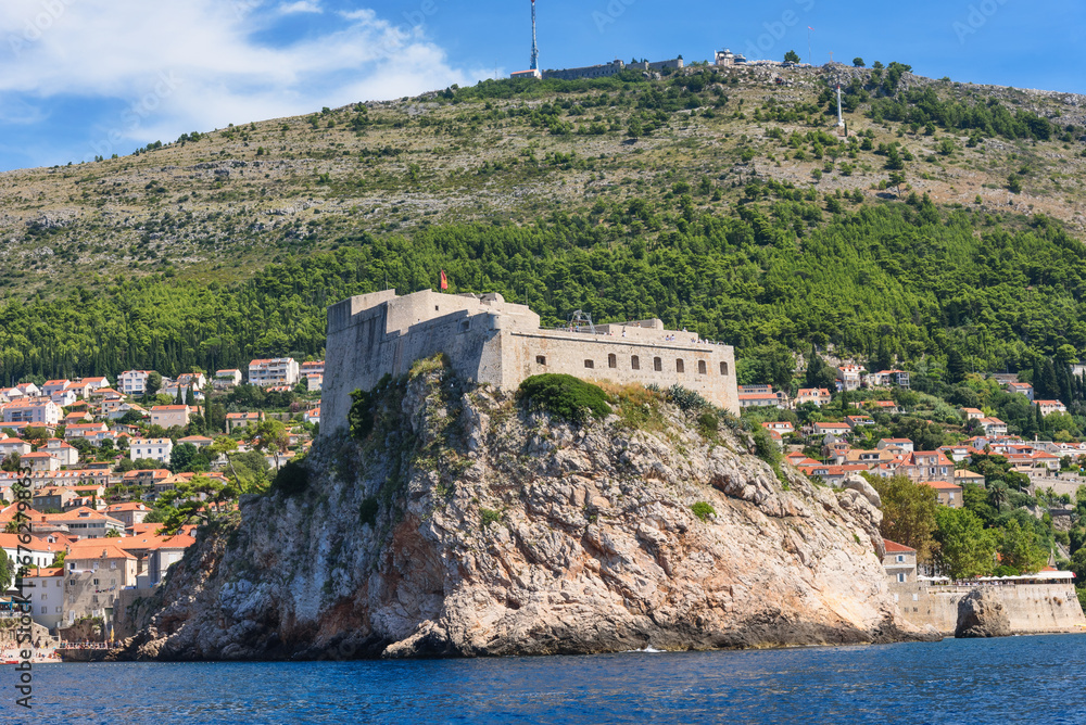Dubrovnik, Croatia - August 03,2023: View at famous travel destination city of Dubrovnik, Dalmatia, Croatia, Europe. View of Dubrovnik from the sea Dubrovnik, Croatia - August 03,2023: View at famous travel destination city of Dubrovnik, Dalmatia, Croatia, Europe. View of Dubrovnik from the sea