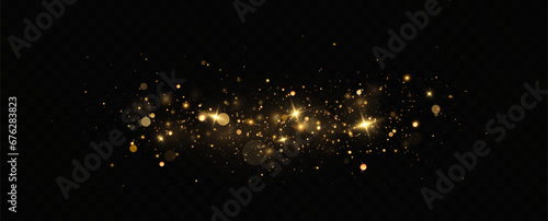 Golden sequins glow with many lights. Glittering dust. Luxurious background of golden particles.