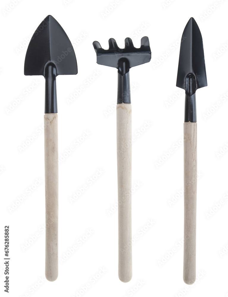 Garden shovels and rake isolated on a white background Garden shovels and rake isolated on a white background