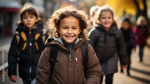 Group of young children walking together in friendship in school 