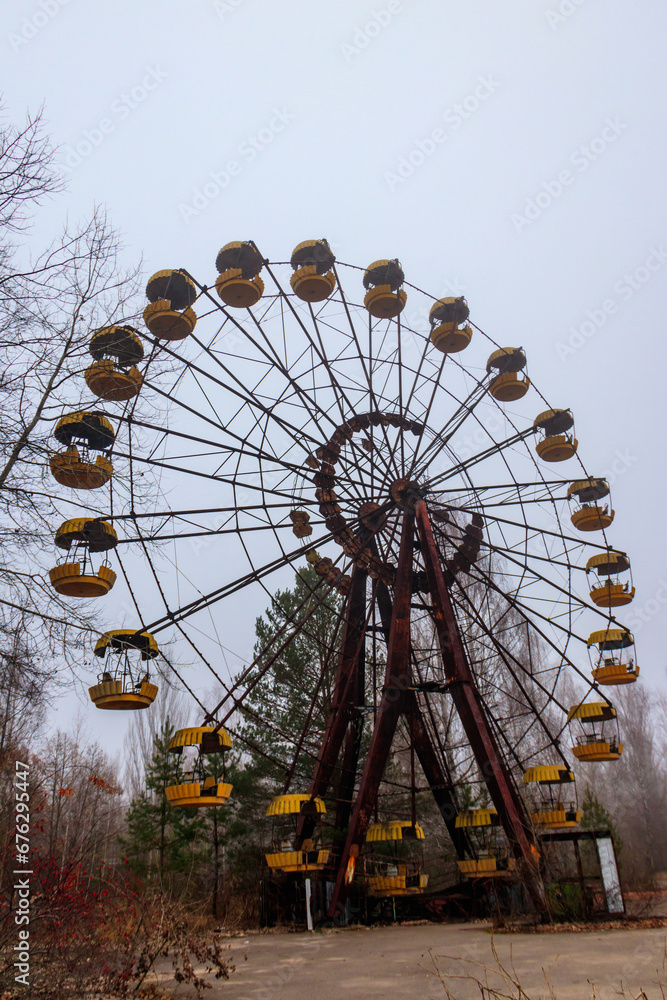 Abandoned Ferris Wheel in the amusement park of ghost town Pripyat in Chernobyl Exclusion Zone, Ukraine Abandoned Ferris Wheel in the amusement park of ghost town Pripyat in Chernobyl Exclusion Zone, Ukraine