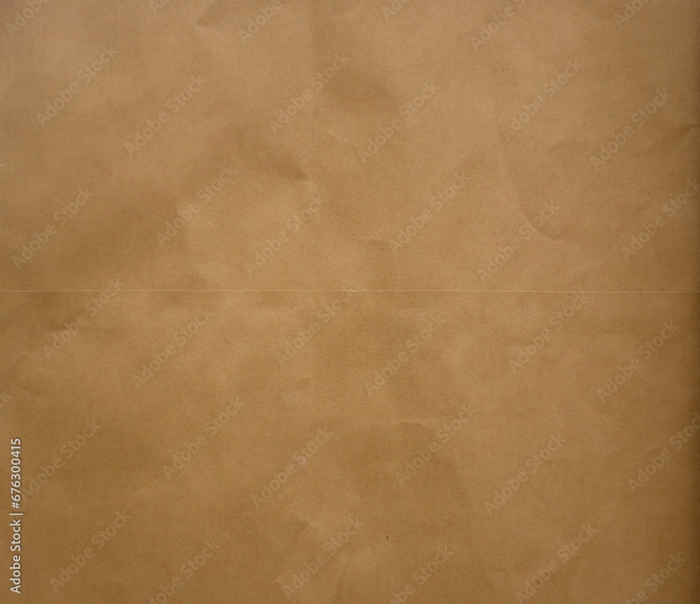 For the design background brown corrugated cardboard texture background. Brown paper cardboard with soft color. Brown corrugated cardboard texture is useful as a background. For the design background brown corrugated cardboard texture background. Brown paper cardboard with soft color. Brown corrugated cardboard texture is useful as a background.