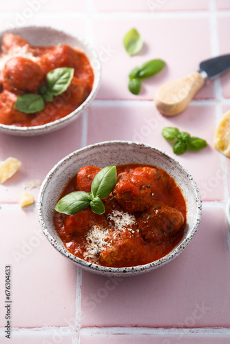 Homemade meatballs with tomato sauce and cheese