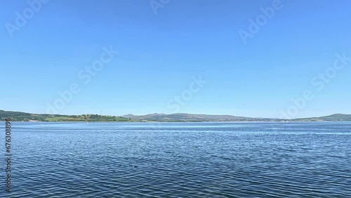 Greenock Esplanade View.  The view across the Firth of Clyde from Greenock esplanade.  Greenock is a town located on the Firth of Clyde in the west of Scotland.