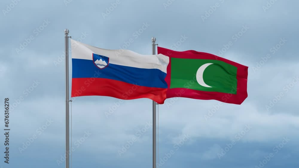 Maldives flag and Slovenia flag waving together on cloudy sky, endless seamless loop, two country relations concept Maldives flag and Slovenia flag waving together on cloudy sky, endless seamless loop, two country relations concept