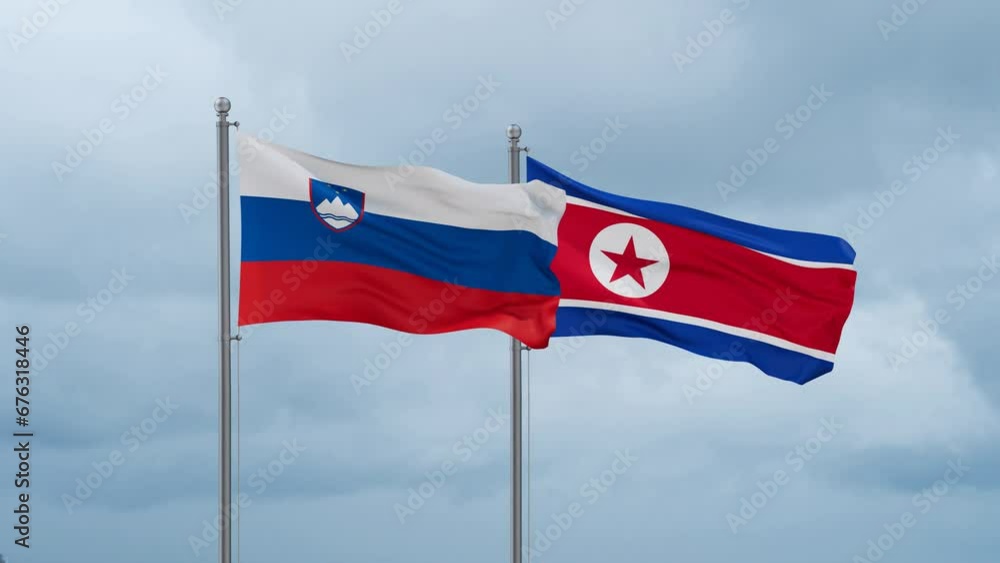 North Korea and Slovenia flag waving together on cloudy sky, endless seamless loop North Korea and Slovenia flag waving together on cloudy sky, endless seamless loop