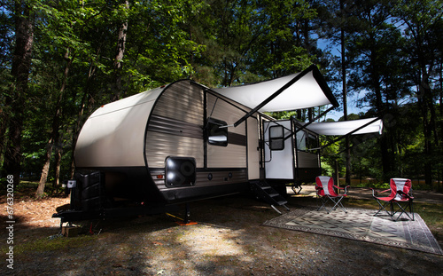 RV with awnings extended © Guy Sagi