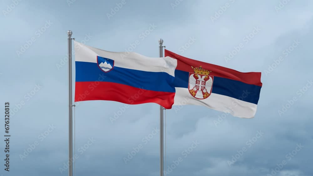 Republic of Serbia and Slovenia flag waving together on cloudy sky, endless seamless loop, two country cooperation concept Republic of Serbia and Slovenia flag waving together on cloudy sky, endless seamless loop, two country cooperation concept