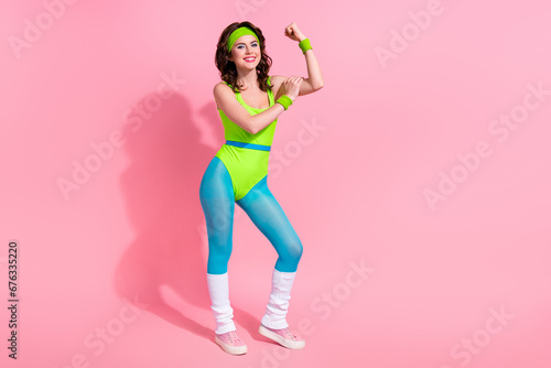 Photo of sportive lady doing power weight lifting show result arm triceps isolated on pastel color background