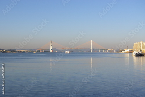 Cross-sea bridge. Reflection.Morning