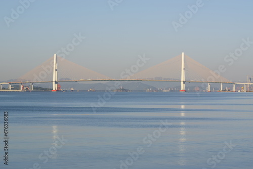 Cross-sea bridge. Reflection.Morning