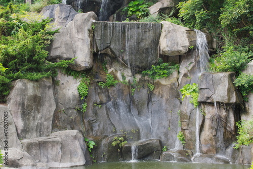 Rockery.Waterfall.Fish pond.Scenic spots Queshi Scenic Area, Shantou, China photo
