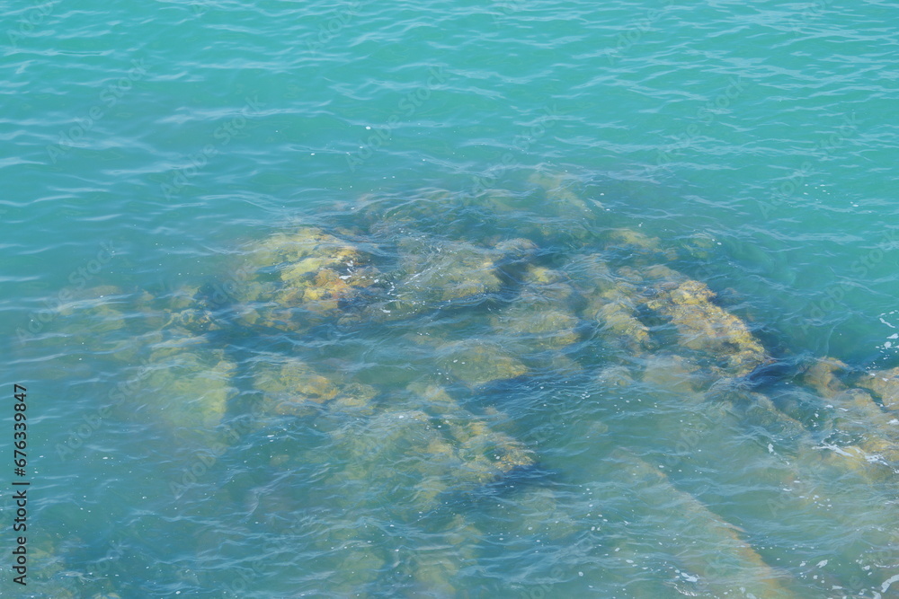 Rocks under clear sea water