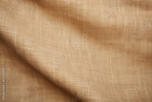 Textured burlap fabric with natural beige tones and a woven pattern abstract closeup background. Natural material eco friendly concept