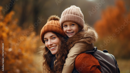 mother and daughter smiling and having fun in nature