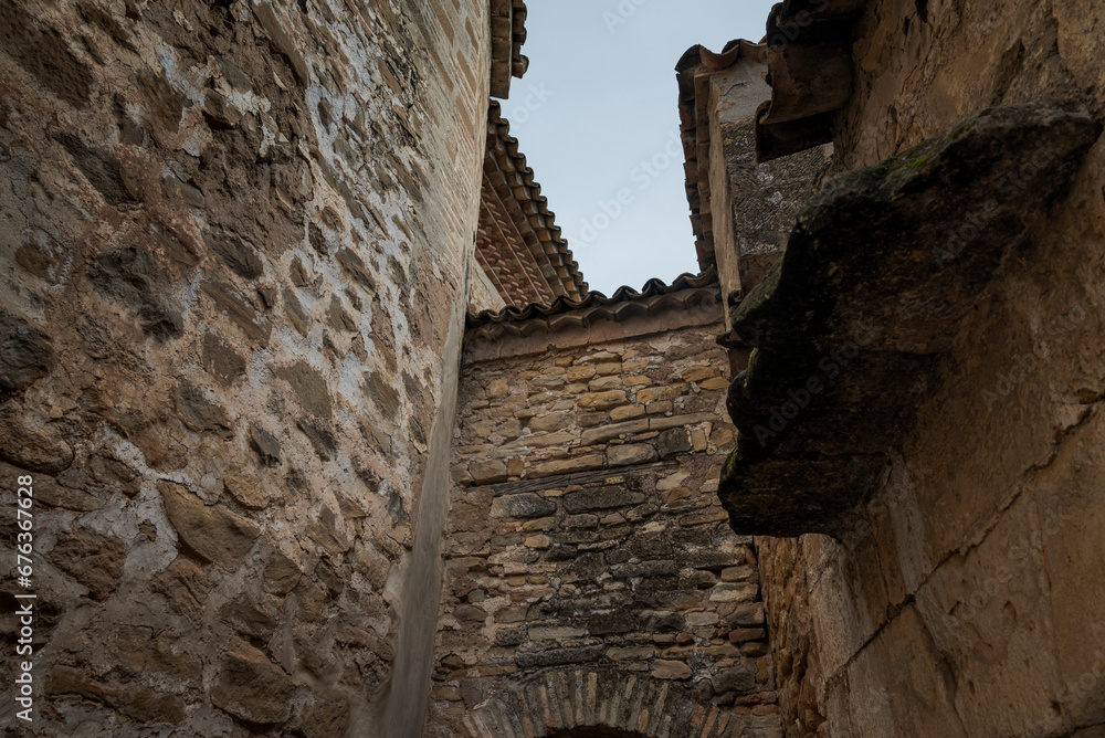 Fototapeta premium Street in the old town of the city of Baeza, by the Cathedral, in the province of Jaen, Spain. In 2003, UNESCO declared the historic centre and landmarks of the city a World Heritage Site