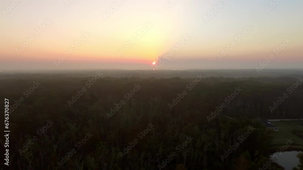 Aerial Scenic Shot Of Houses During Sunset, Drone Flying Forward Over Green Trees On Landscape - Bayou, Louisiana Aerial Scenic Shot Of Houses During Sunset, Drone Flying Forward Over Green Trees On Landscape - Bayou, Louisiana