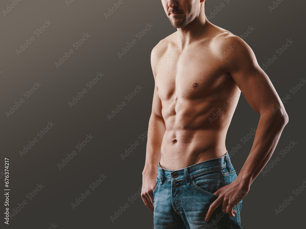Handsome shirtless sensual man posing