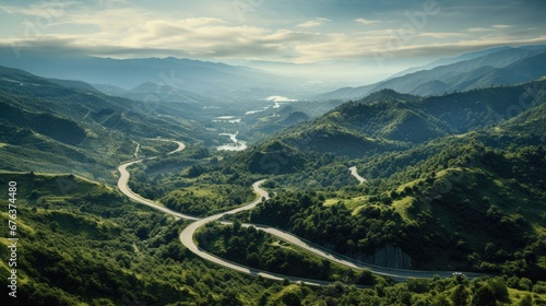 Aerial view of a scenic road trip through a winding mountain pass.