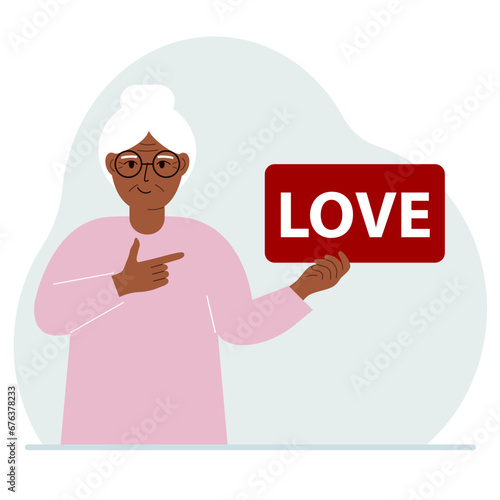 A woman holds a red banner with the text love. The concept of valentine's day, holiday or psychological help.